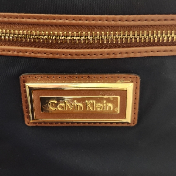 Calvin Klein Navy Backpack with Brown Trim and Gold Accents Preloved - Picture 9 of 12